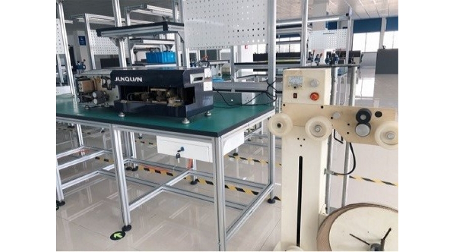 Ribbon cable stripping machine